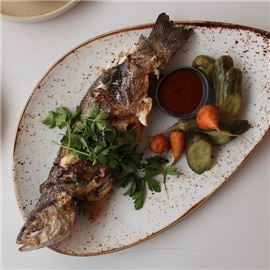 Wood-Roasted Whole Branzino Fish, Salsas Herbs and Crème Fraîche